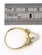 Elegant Pearl and Diamond Ring