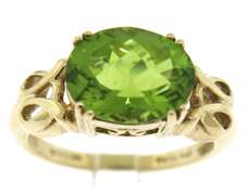 Fancy Oval Peridot Yellow Gold Ring