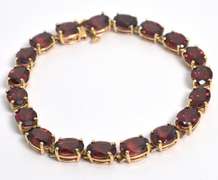 Garnet Tennis Style Bracelet in 14KT