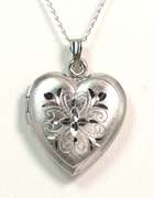 Sweet Lasered Heart Locket in Sterling Silver