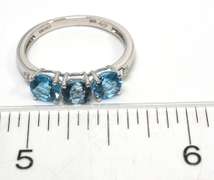 Blue Topaz Ring in White Gold