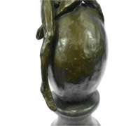 Nude Male Resting on Top of the World Bronze Sculpture