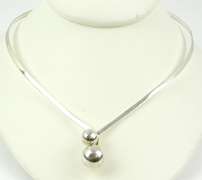 Sleek Sterling Silver Ball Neckpiece