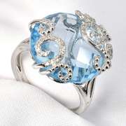 Stylish Blue Topaz & Diamond Ring in 14K WG