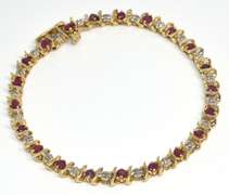 Diamond & Ruby Tennis Bracelet in 14KT