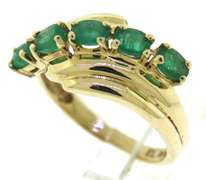 Pretty Oval Emerald Bypass Ring