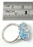 Stylish Blue Topaz & Diamond Ring in 14K WG