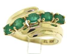 Pretty Oval Emerald Bypass Ring