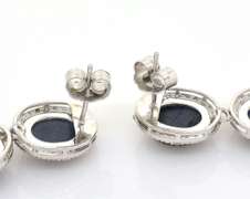 Hypnotic Star Sapphire & Diamond Dangle Earrings in Sterling Silver