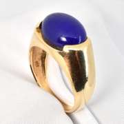Tasteful Man's Cabochon Lapis Ring in 14k yellow gold weighing 6.3 grams.