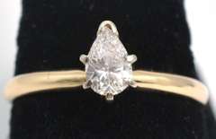1/2CT Pear-Cut Diamond Solitaire Ring in 14KT Yellow Gold