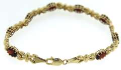 Pretty Oval Garnet Bracelet in 14kt