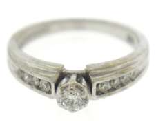 Dazzling 14kt WG Diamond with Channel Set Sides Ring