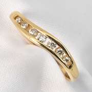 Curved Channel Set Diamond Ring