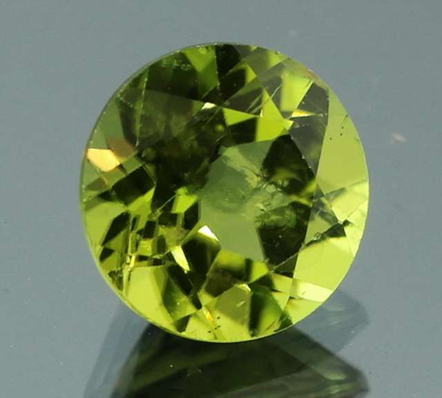 Radiant spring green 3.30ct untreated Peridot solitaire