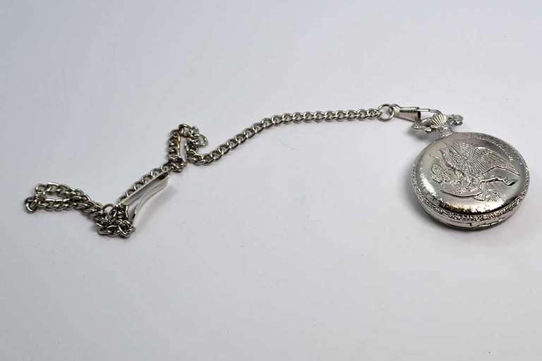 Ornate Men's Pocket Watch with Half Dollar .