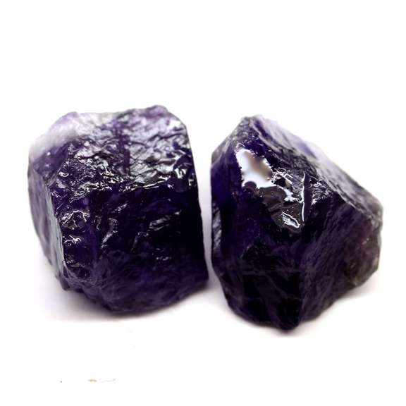 Collectors rich untreated 18.64ct uncut Amethyst pair