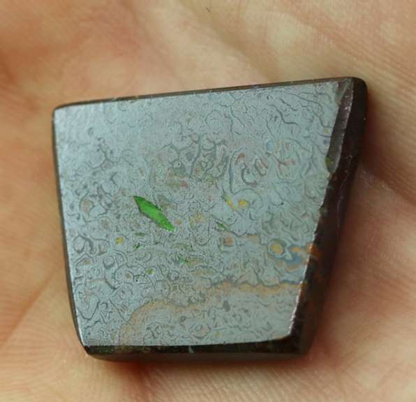 Incredible 33.82ct liquid metallic luster Boulder Opal