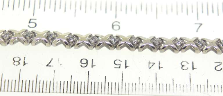 Elegant White Gold Diamond X Link Bracelet
