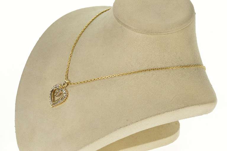 10K Yellow Gold 0.68 Ctw Baguette Diamond Curvy Heart Love Pendant