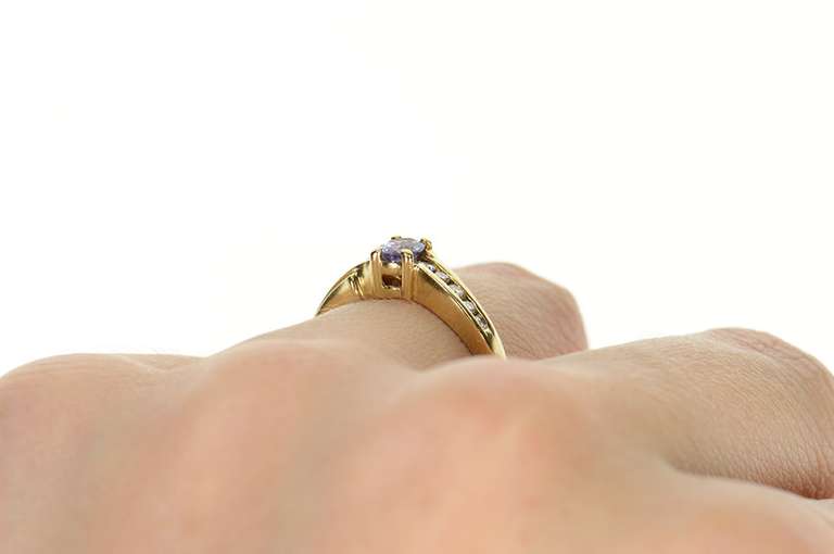 10K Yellow Gold Oval Tanzanite Diamond Accent Wavy Ring