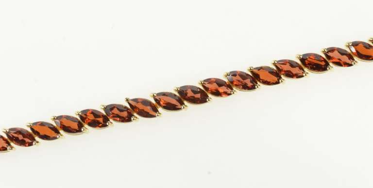 14K Yellow Gold Marquise Garnet Encrusted Fancy Tennis Bracelet