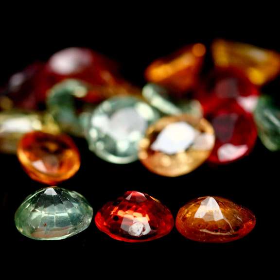 Heated only! 8.20ct fancy color Sapphire set
