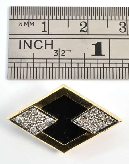 Modern Onyx and Diamond Brooch