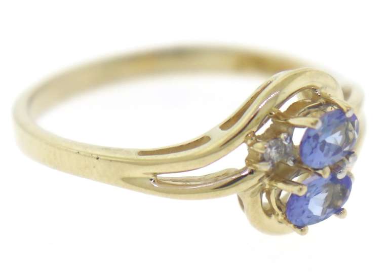 Stunning Tanzanite and Diamond Yellow Gold Ring