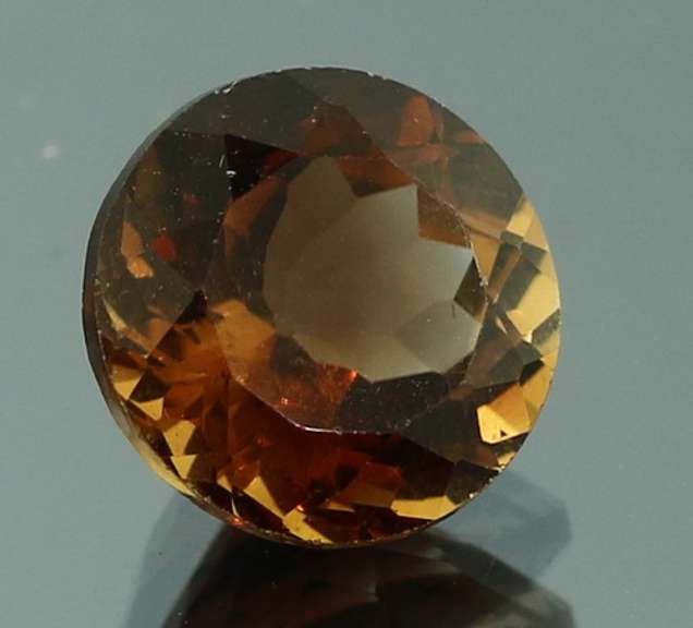 Rich red amber 4.76ct Imperial Topaz solitaire