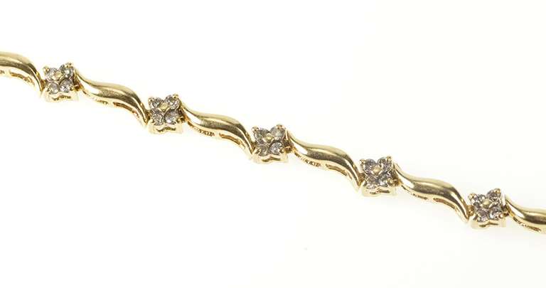 14K Yellow Gold 1.00 Ctw Flower Diamond Wavy Design Tennis Bracelet