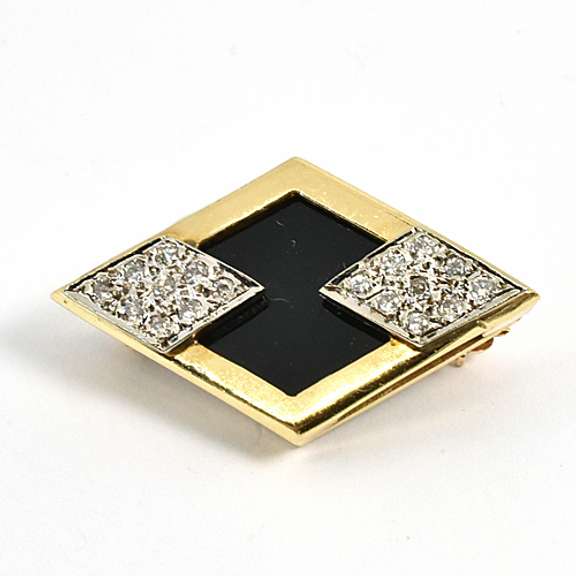 Modern Onyx and Diamond Brooch