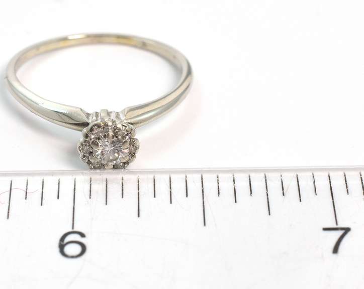 Shimmering 0.19CTW Diamond Ring in 14KT White Gold