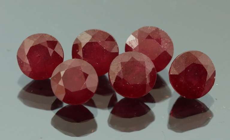 Heavy 13.64ct cut Ruby solitaire set