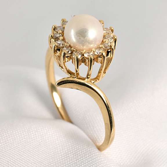 Feminine Pearl and Diamond Ring