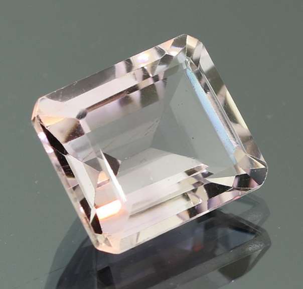 Glittering emerald cut 9.86ct pink Amethyst