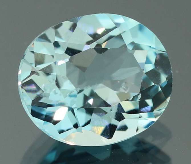 Brilliant 5.79ct oval cut Topaz center stone