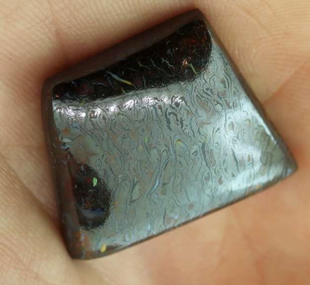 Incredible 33.82ct liquid metallic luster Boulder Opal