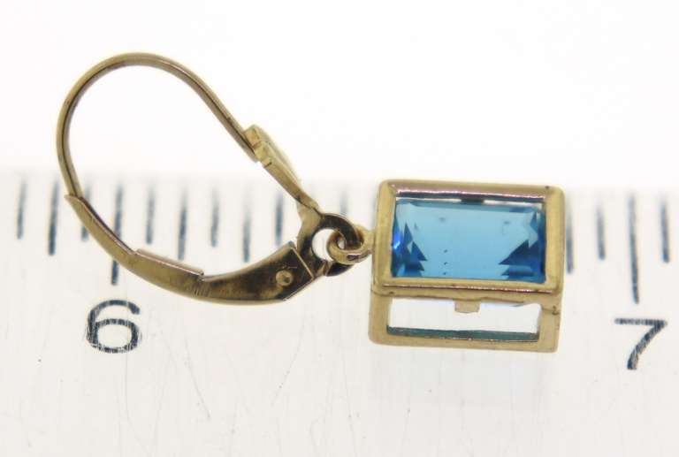 Pretty Blue Topaz Bezel Set Yellow Gold Earrings