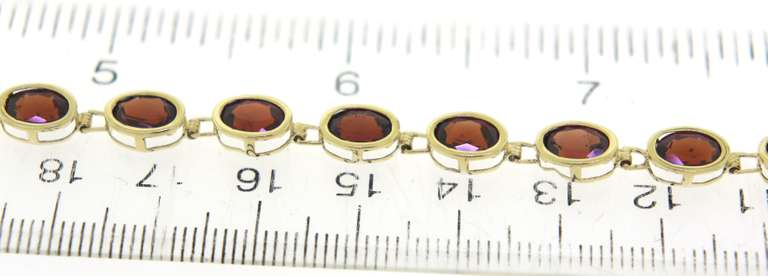Pretty Yellow Gold Garnet Bezel Set Bracelet