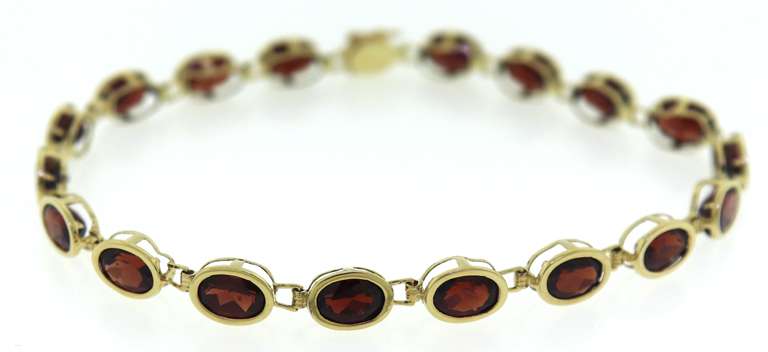 Pretty Yellow Gold Garnet Bezel Set Bracelet