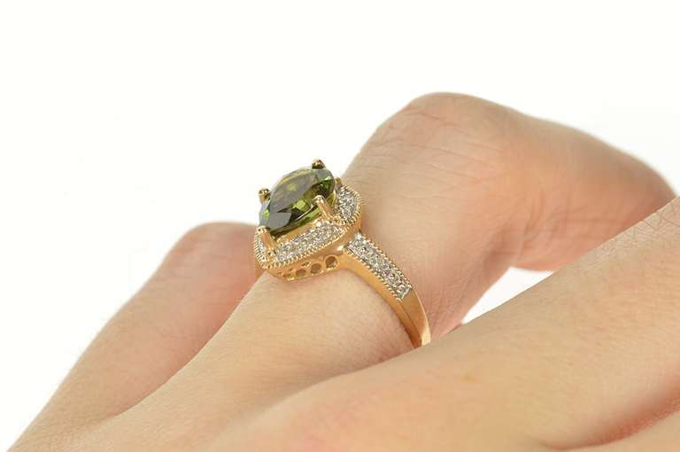 10K Yellow Gold Pear Syn. Green Tourmaline Diamond Halo Ring