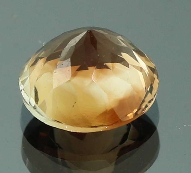 Rich red amber 4.76ct Imperial Topaz solitaire