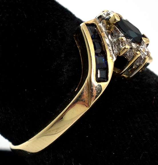 Eye-Catching Sapphire & Diamond Accent Ring in Yellow Gold