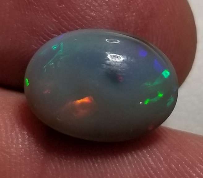 Rare bi-color untreated 6.59ct Welo Black Opal