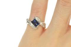 18K White Gold 0.71 Ctw Baguette Sapphire Diamond Bypass Ring