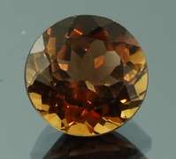 Rich red amber 4.76ct Imperial Topaz solitaire