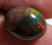 UNHEATED! Collectors 7.21ct smoldering black Opal