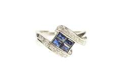 18K White Gold 0.71 Ctw Baguette Sapphire Diamond Bypass Ring