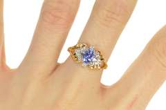 14K Yellow Gold Oval Tanzanite Diamond Halo Engagement Ring